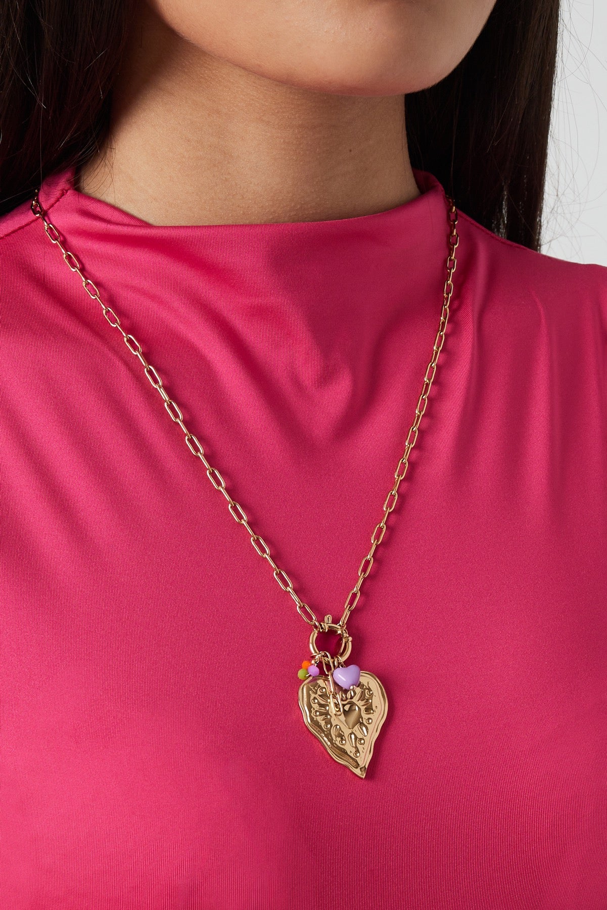 Lange schakelketting met hart bedel goud
