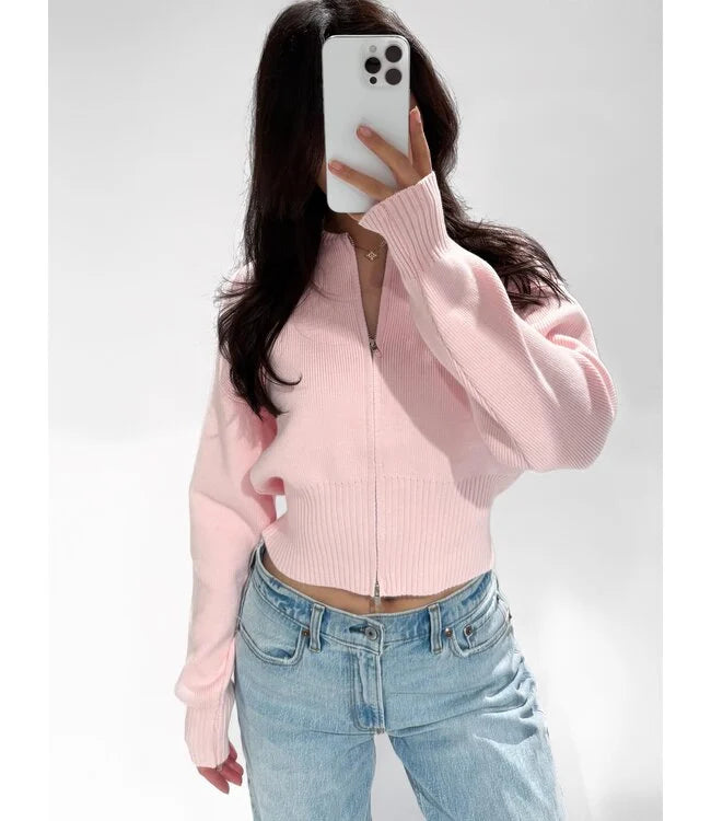 Cardigan vest met lange mouw en ritssluiting in roze kleur