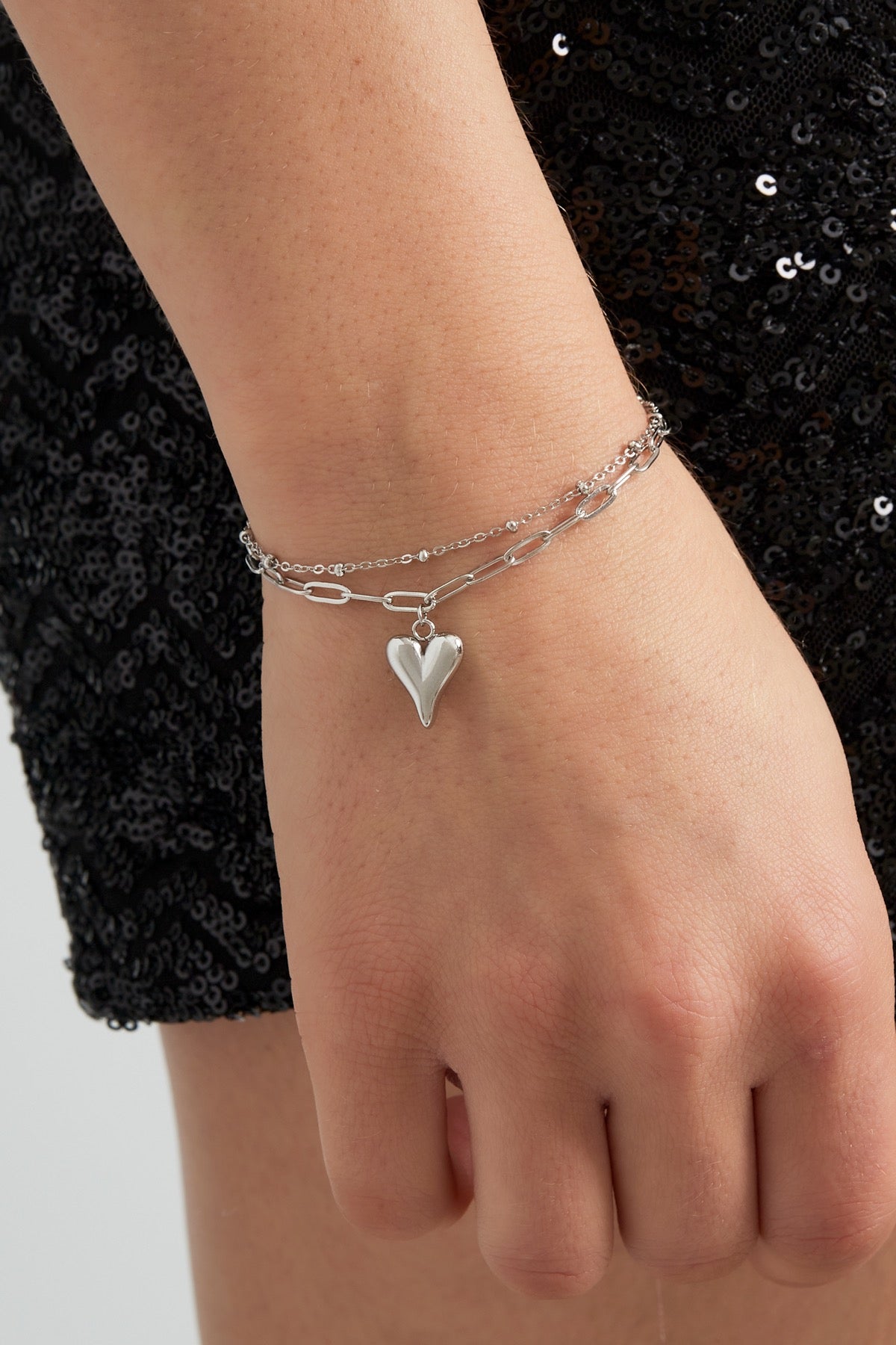 Schakelarmband met hartjes hanger zilver