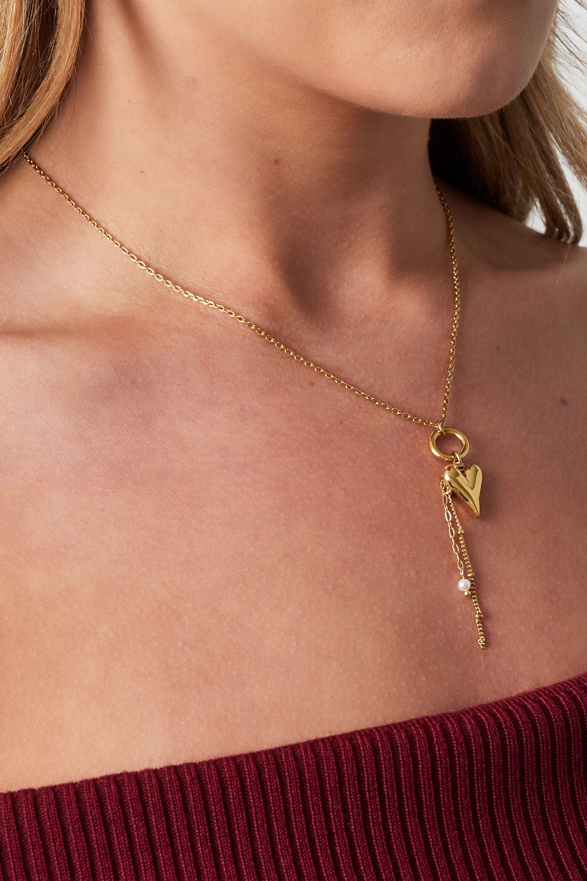 Ketting met hart hanger en parels in het goud