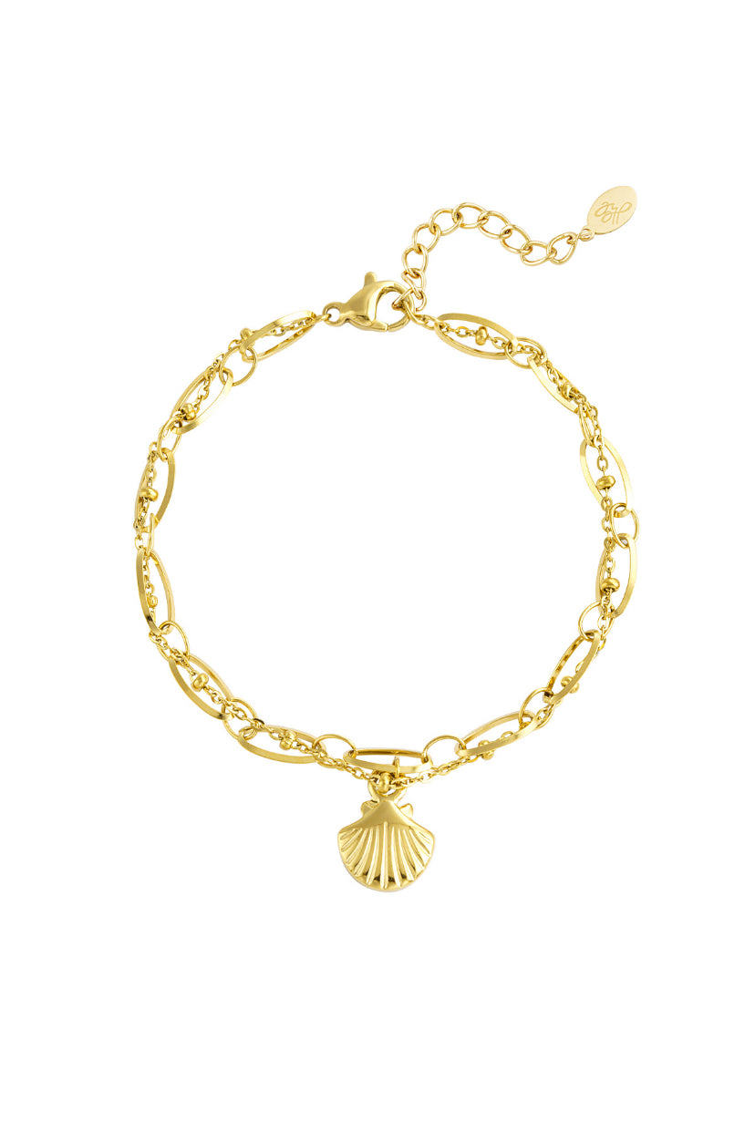 Schakelarmband goudkleurig met bedel van schelp