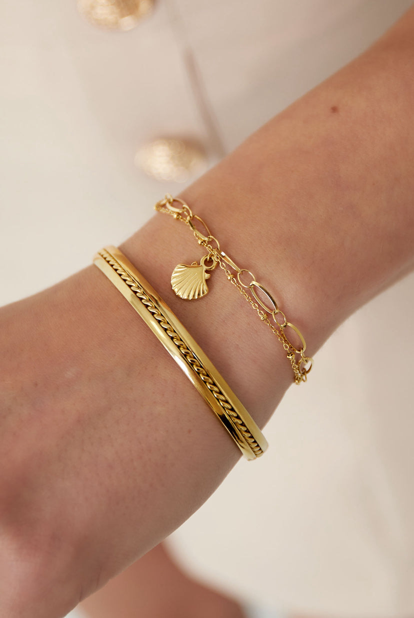 Schakelarmband bedel van schelp goud