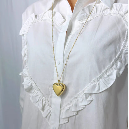 Lange ketting met hartje in het goud