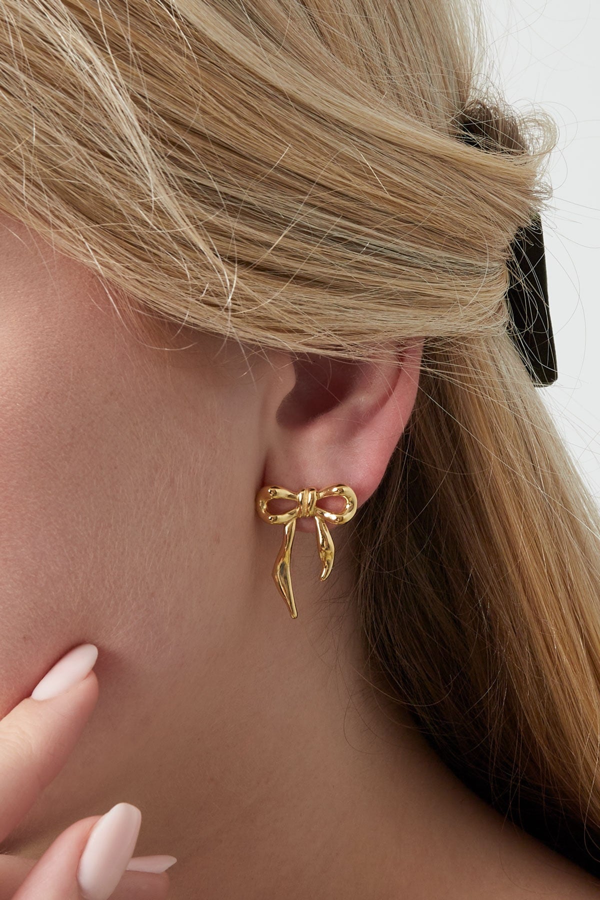 Trendy stud oorbellen van strikjes in het goud