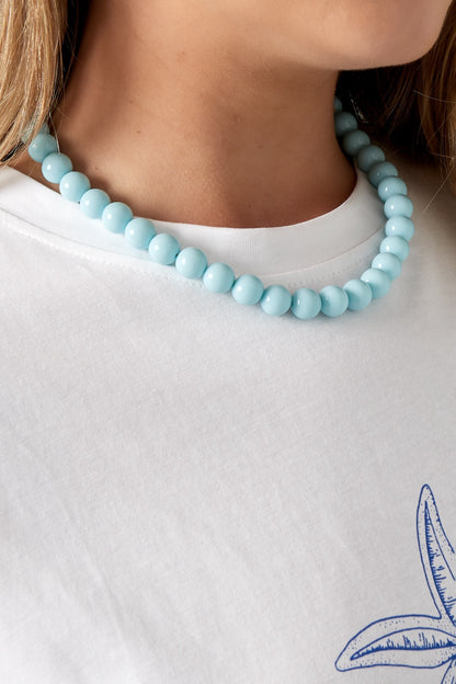 Grote kralenketting met blauwe kralen