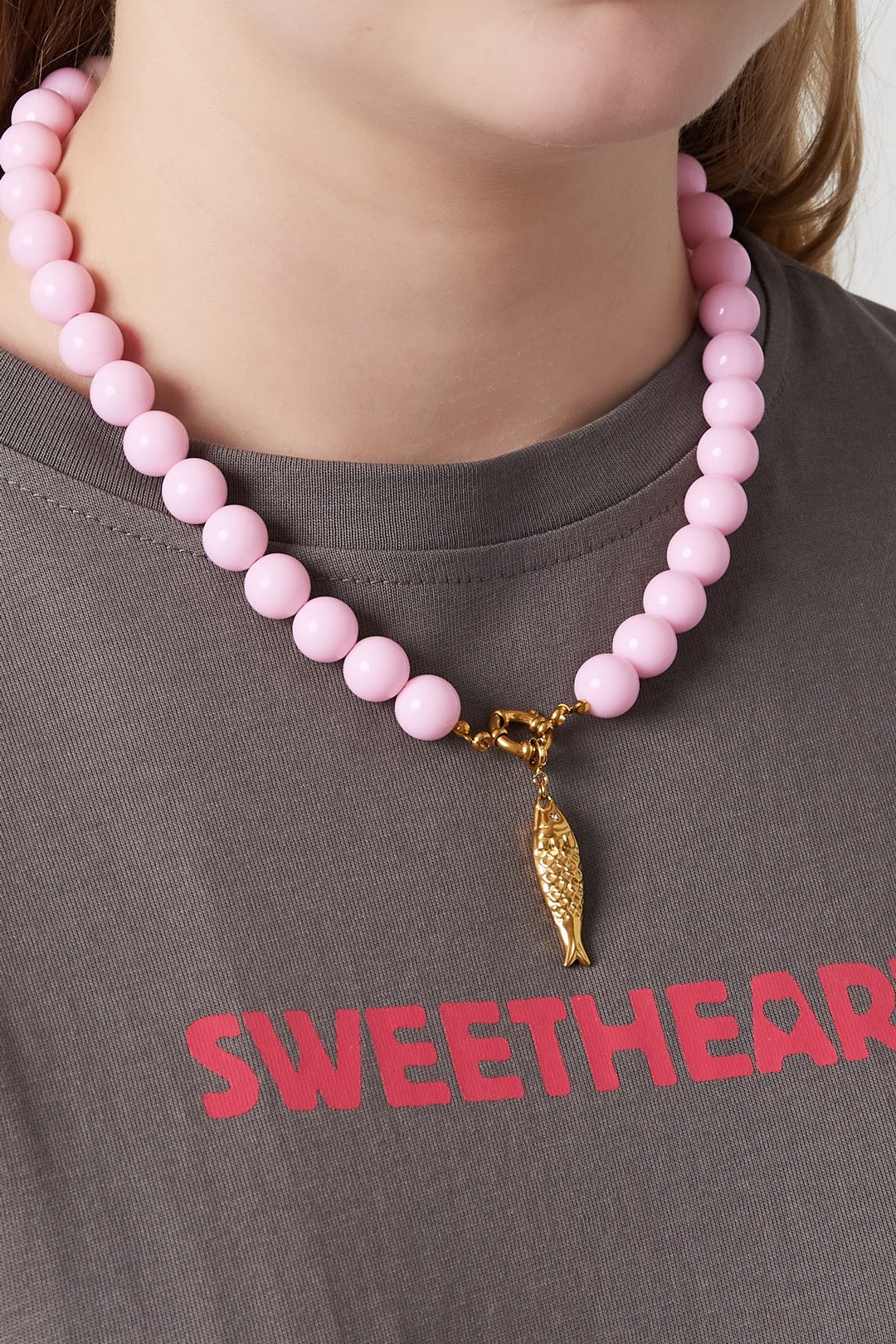 Roze kralenketting