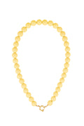 Kralenketting met rond slot en gele kralen
