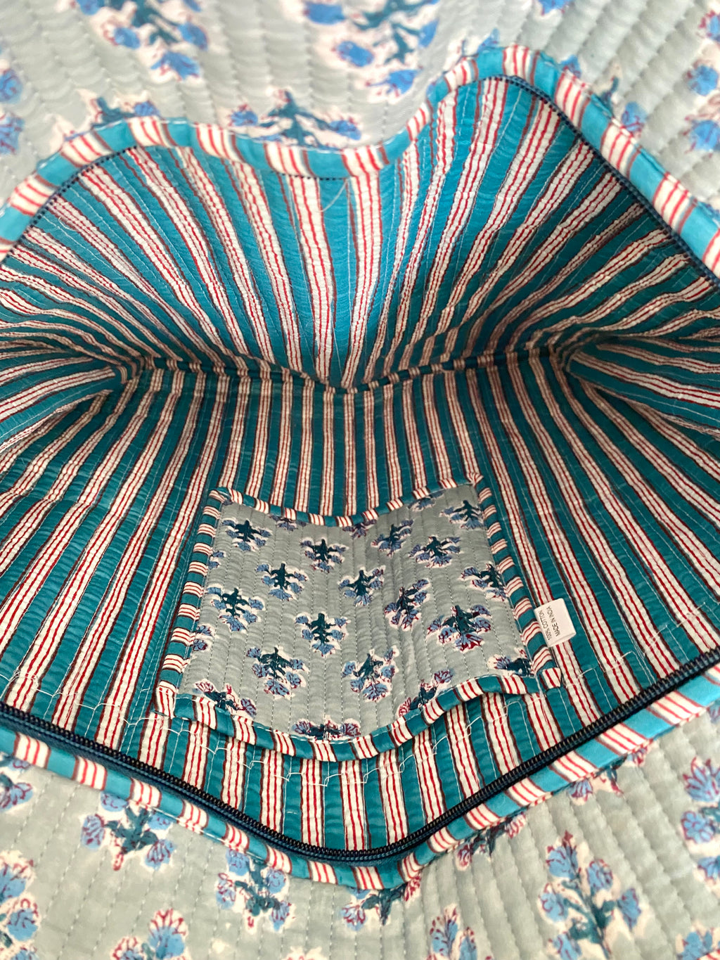 Shopper tas met hengsel, ritssluiting en print van kleine blauwe bloemen