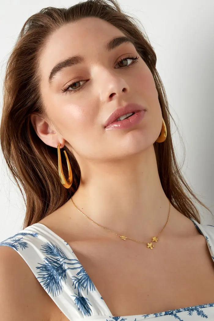 Bloemen ketting goudkleurig subtiel
