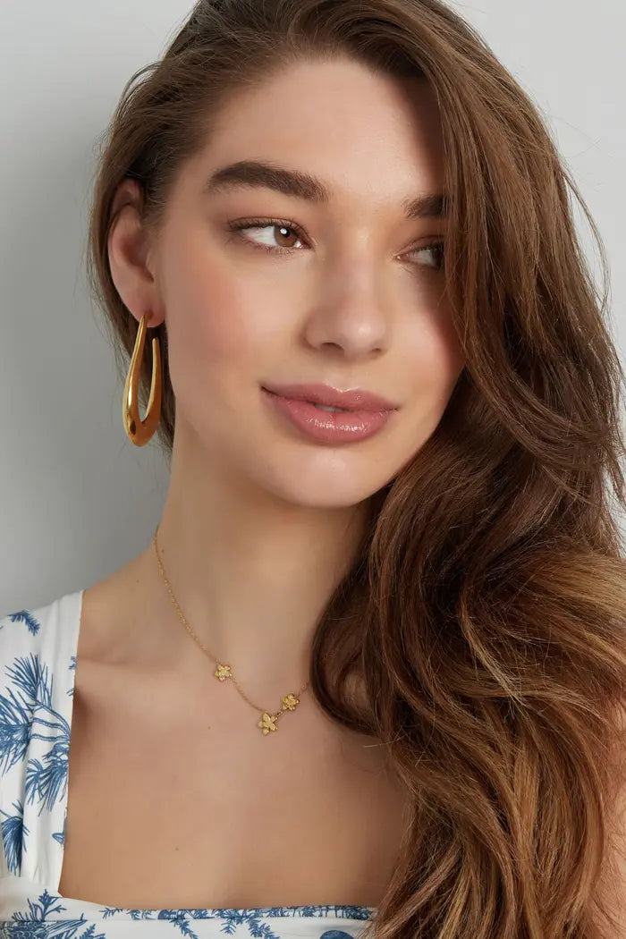 Minimalistische ketting met bloemen goudkleurig