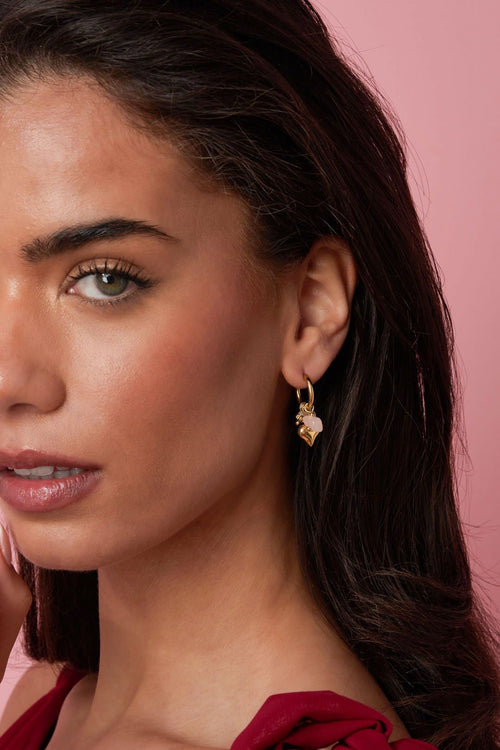 Oorbellen met kralen, parels en hartjes bedel in het goud