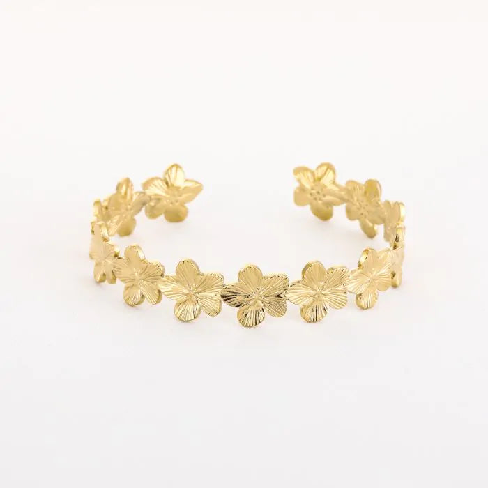 Bangle harde armband met bloemen in het goud