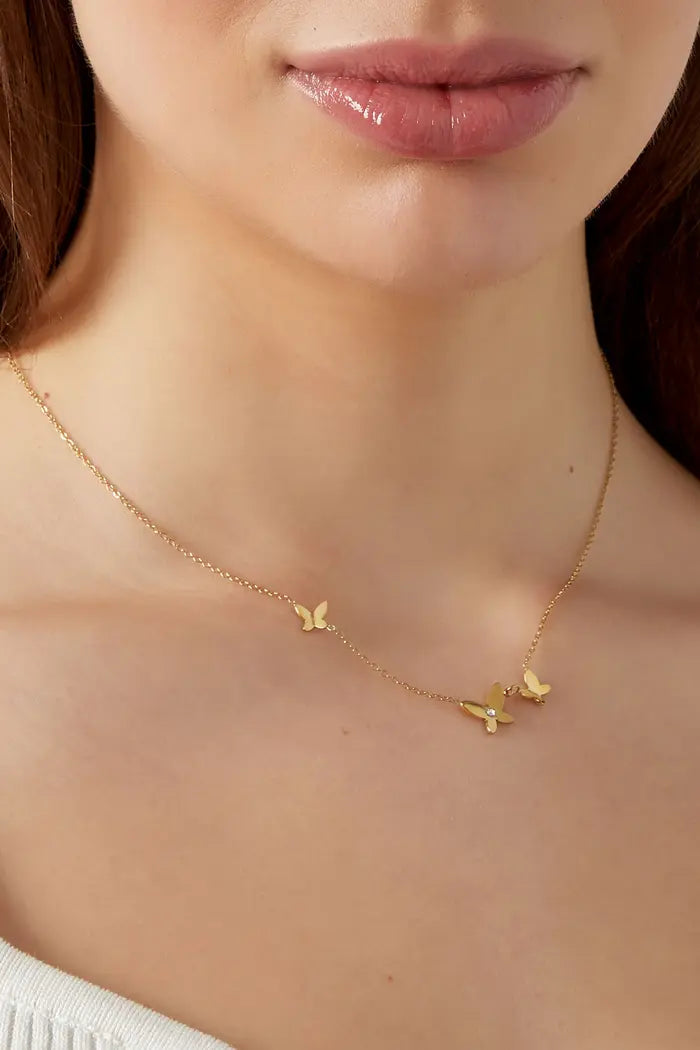 Ketting goudkleurig vlinders subtiel