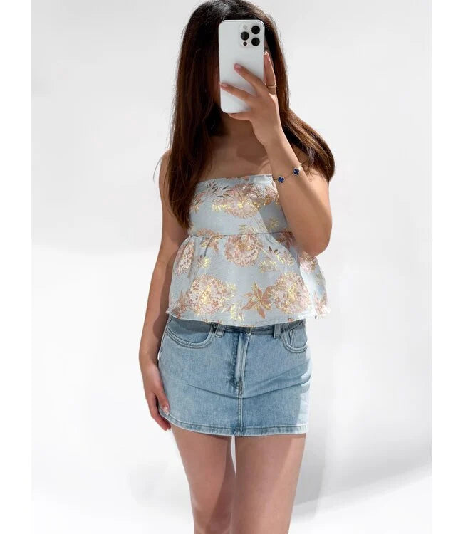 Top met bloemenprint in het blauw zonder mouwen
