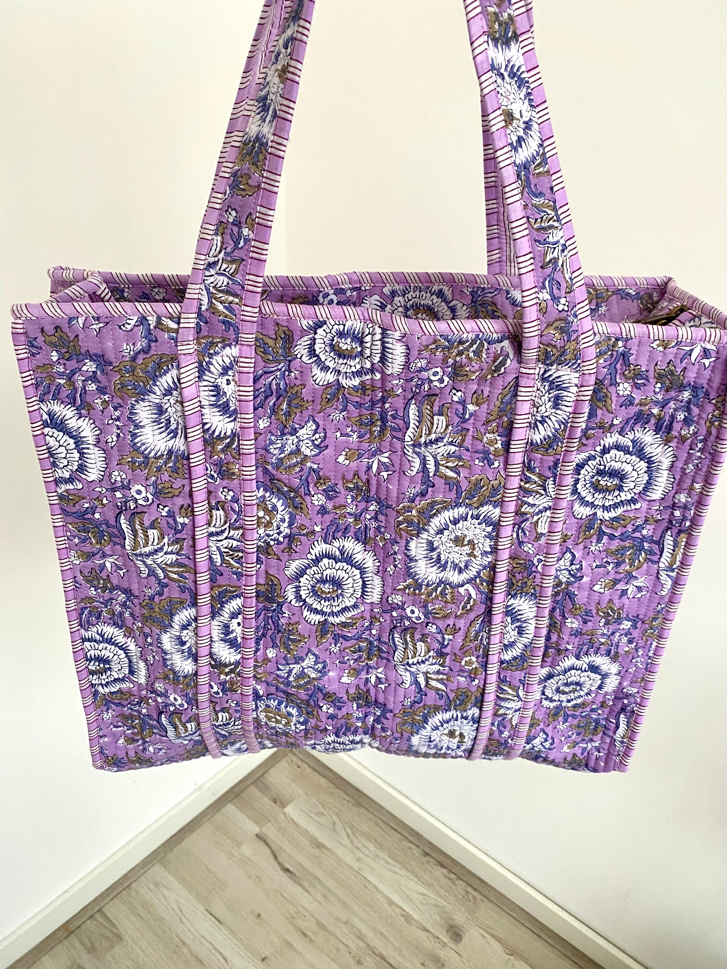 Shopper tas in een vrolijke paarse bloemenprint met lang hengsel en ritssluiting