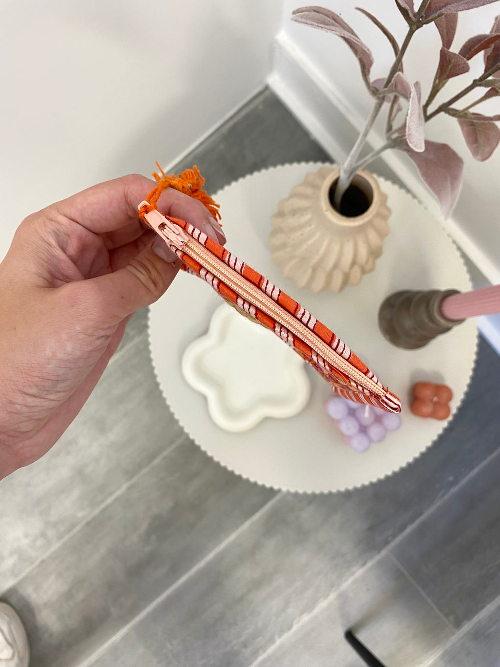 Portemonnee met oranje bloemenprint en ritssluiting