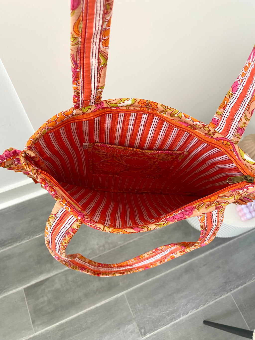 Ibiza tas met lang hengsel en oranje roze bloemen print