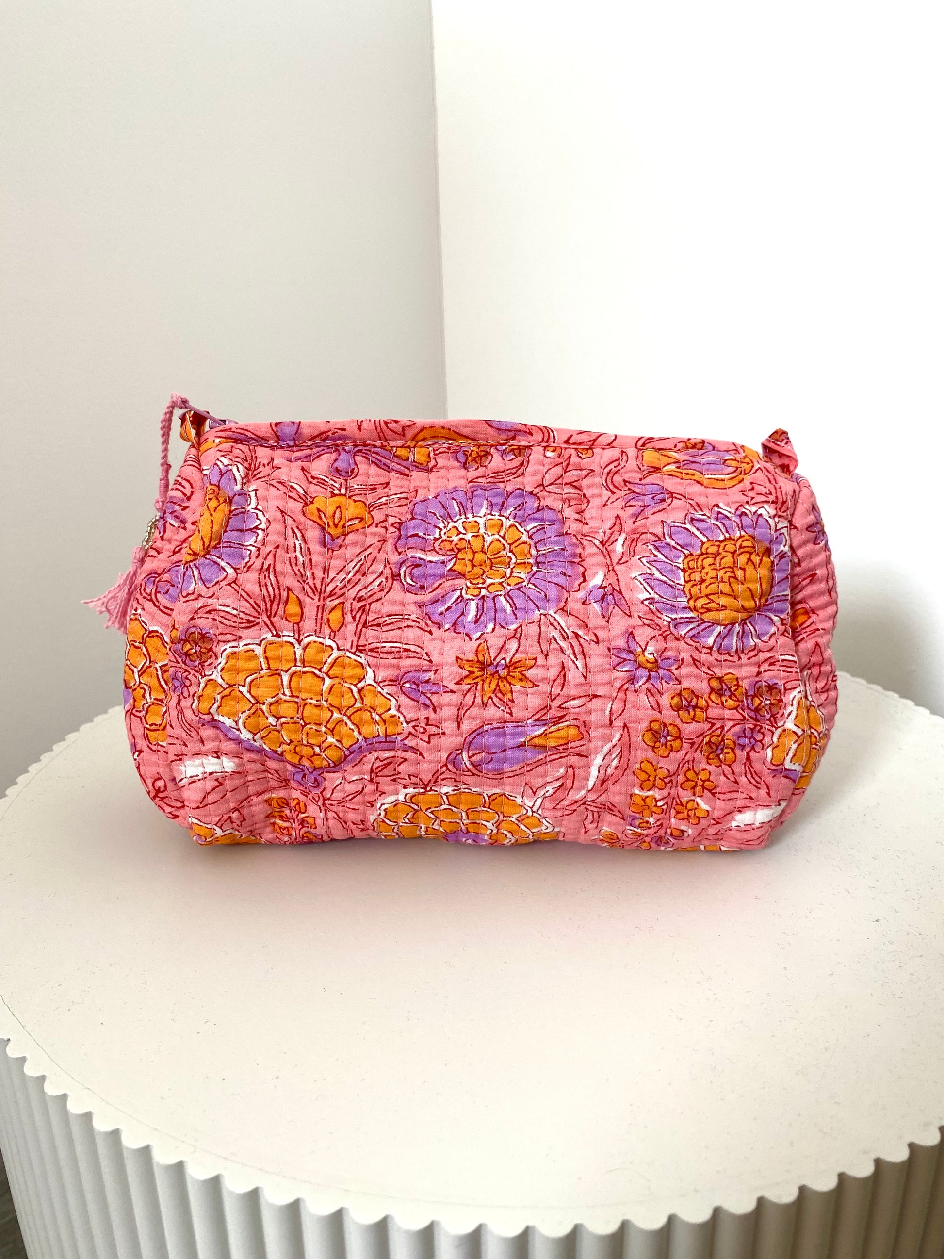 Toilettas met lila roze bloemenprint