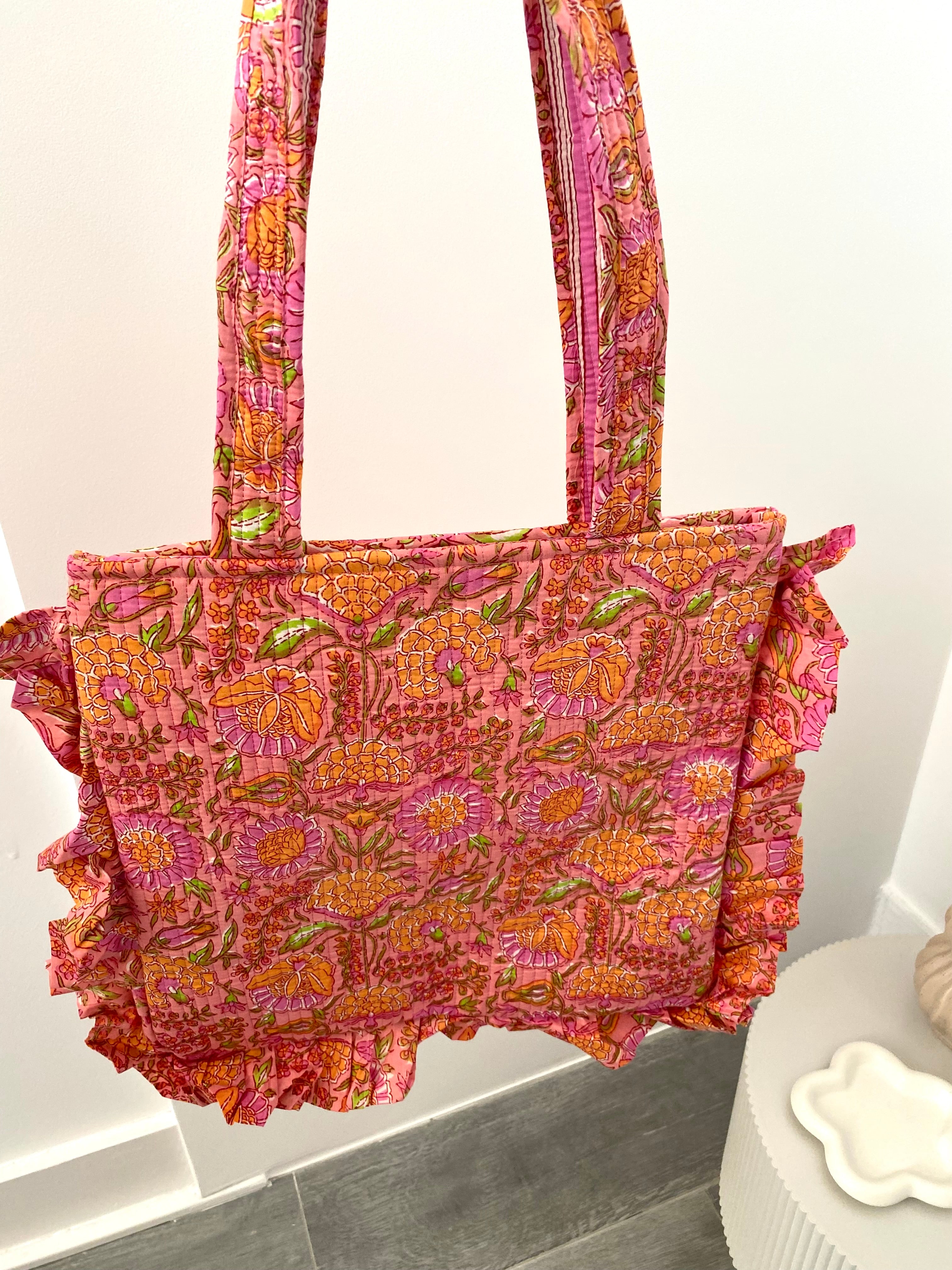 Tas met bloemenprint in het roze met ritssluiting