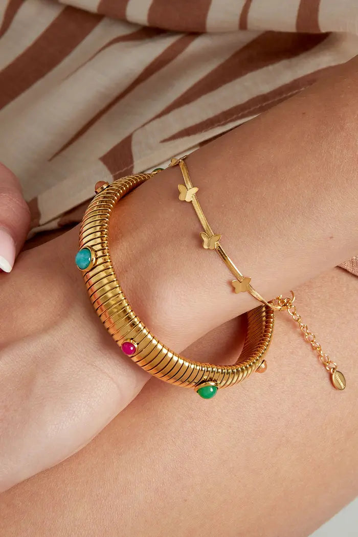 Platte subtiele armband vlinder bedels goudkleurig