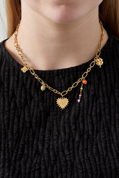 Bedelketting met subtiele bedels goud