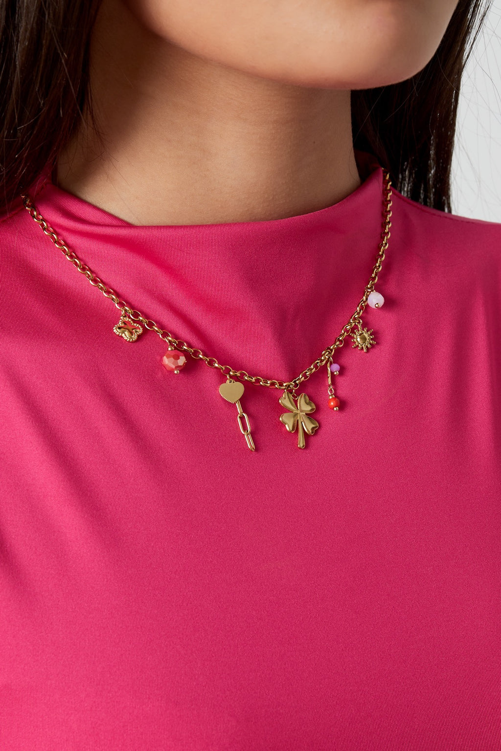 Bedelketting met klaver, hart en kralen bedels goud