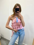 Roze mouwloze top met ruffles en sliertjes