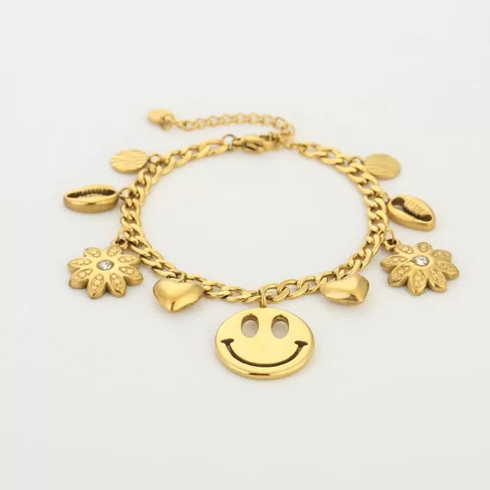 Armband met verschillende bedels trendy goudkleurig