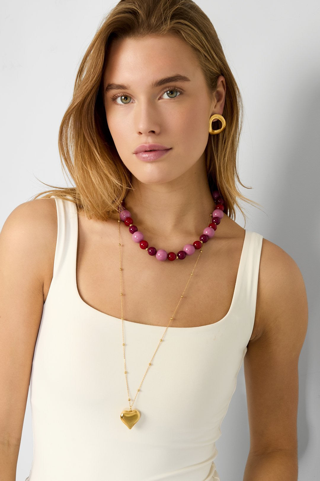 Lange hartjes ketting in het goud