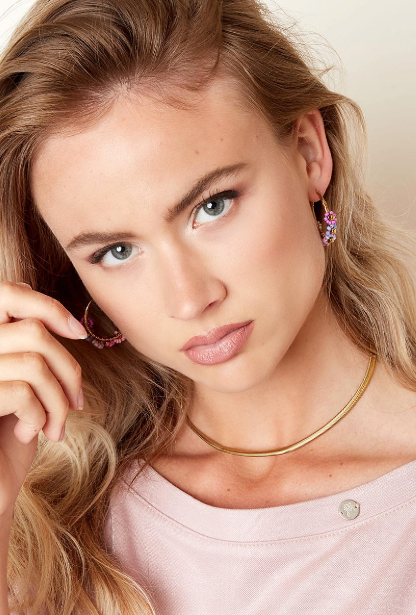 Oorringen en hoops goudkleurig met bloemen waterproof