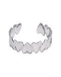 Statement bangle armband in het zilver met hartjes