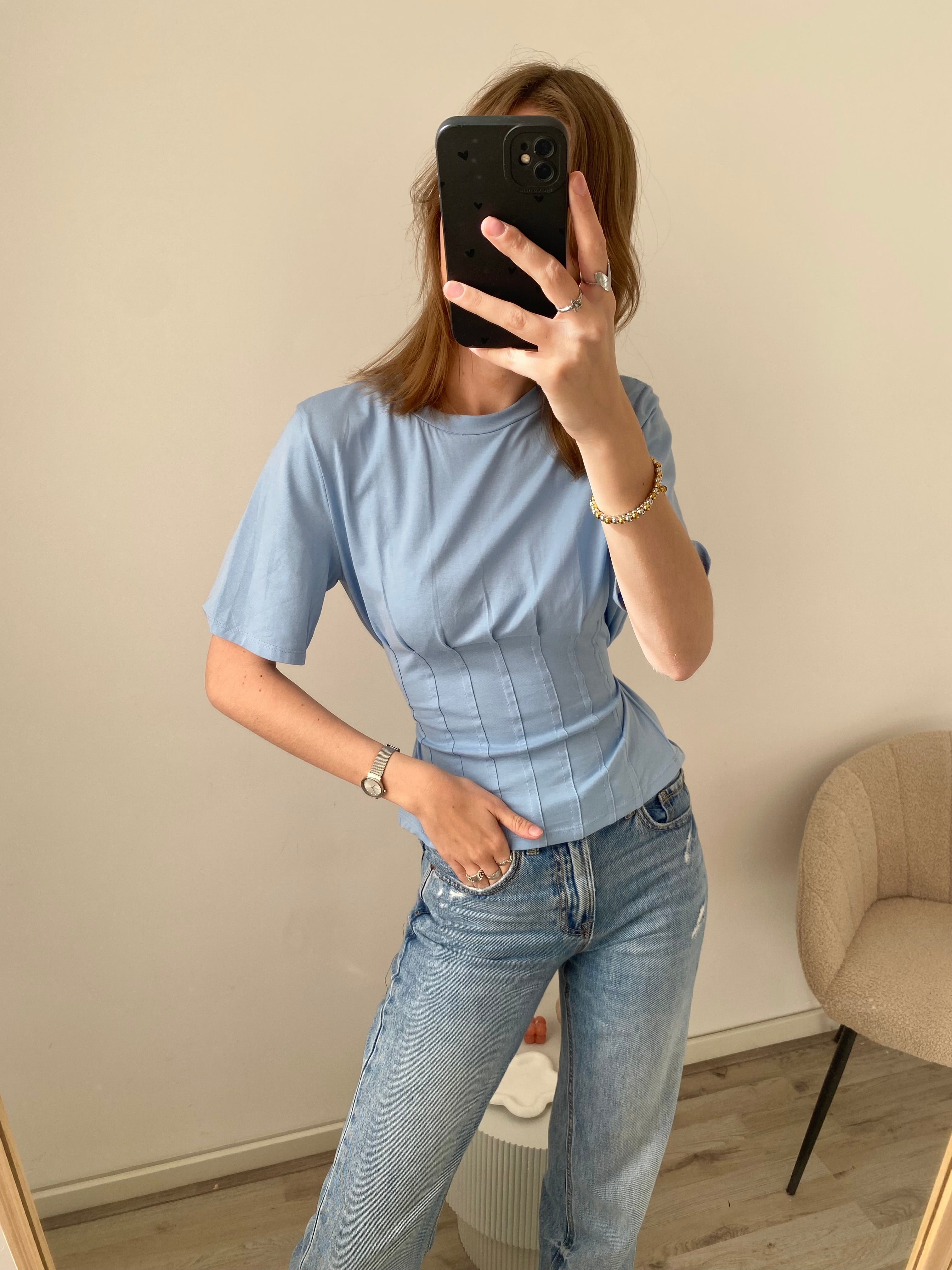 Shirt met korte mouw en getailleerd effect aan de onderkant in het blauw