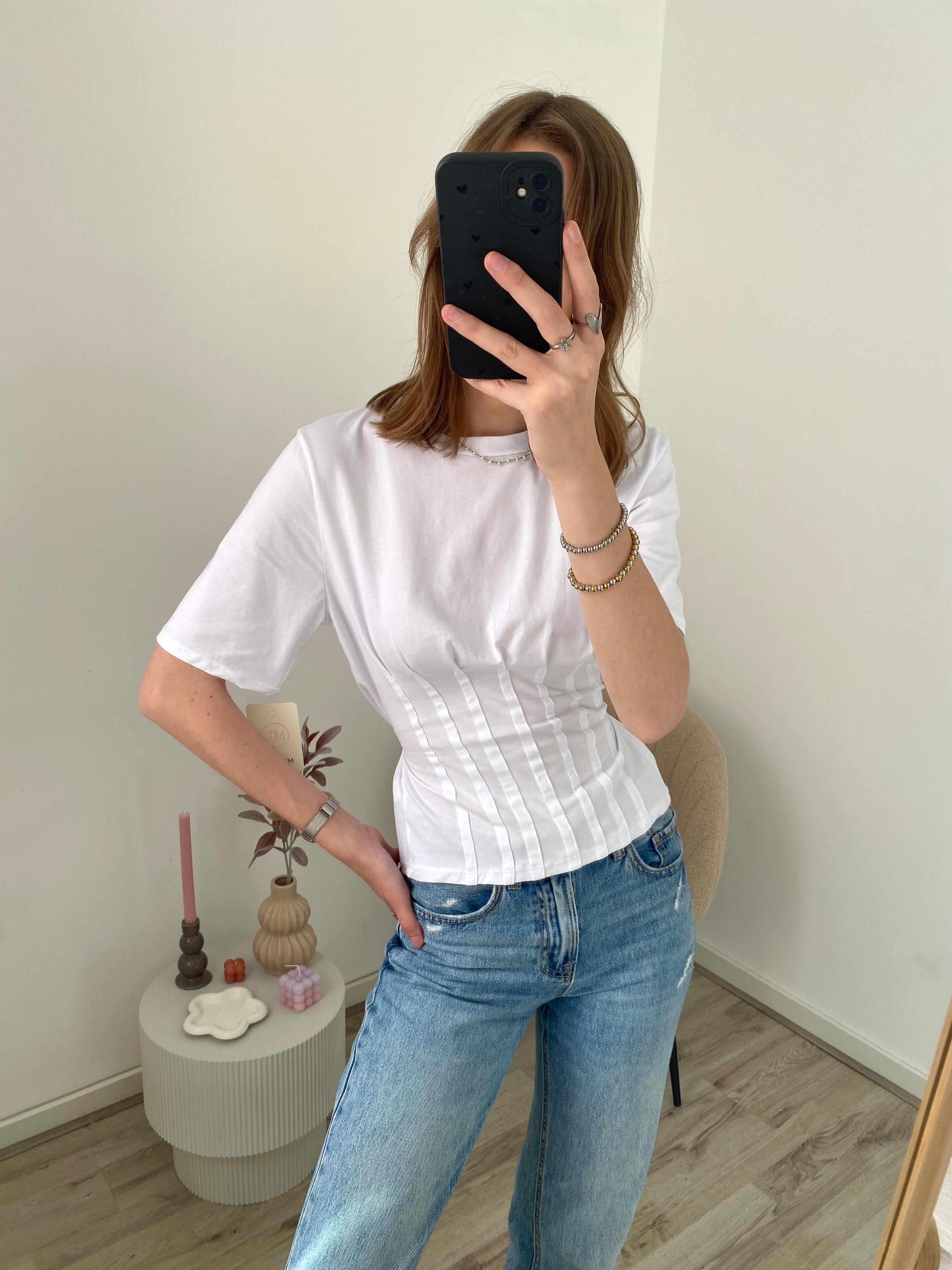 Shirt met korte mouw en getailleerd effect aan de onderkant in het wit
