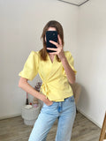 Blazer met overslag en korte pofmouw in gele kleur