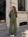 Matchende set in het groen met lange broek en blouse