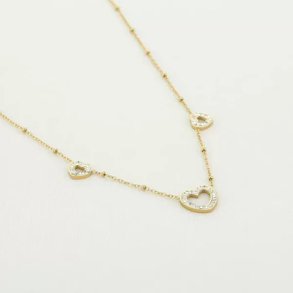 Ketting met hartjes hangers in het goud