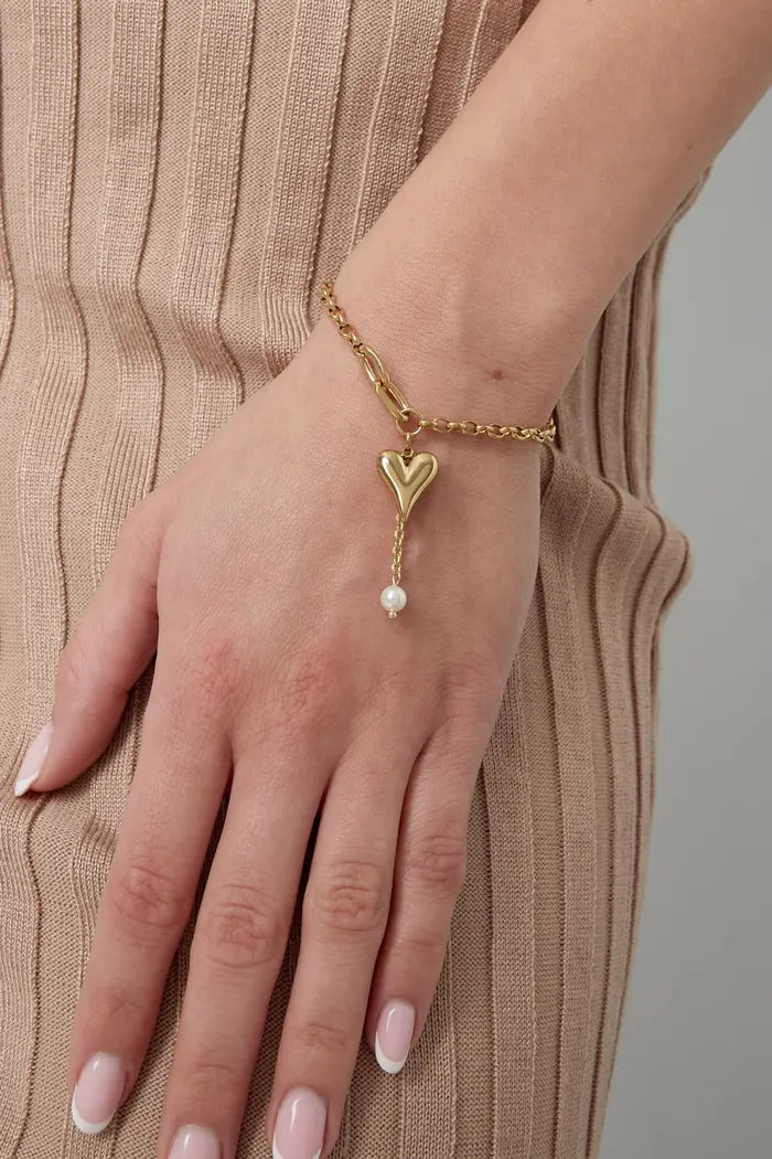Statement armband met hartje en parel in goud