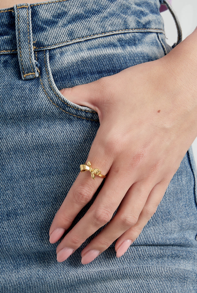 Subtiele trendy strikjes ring goud