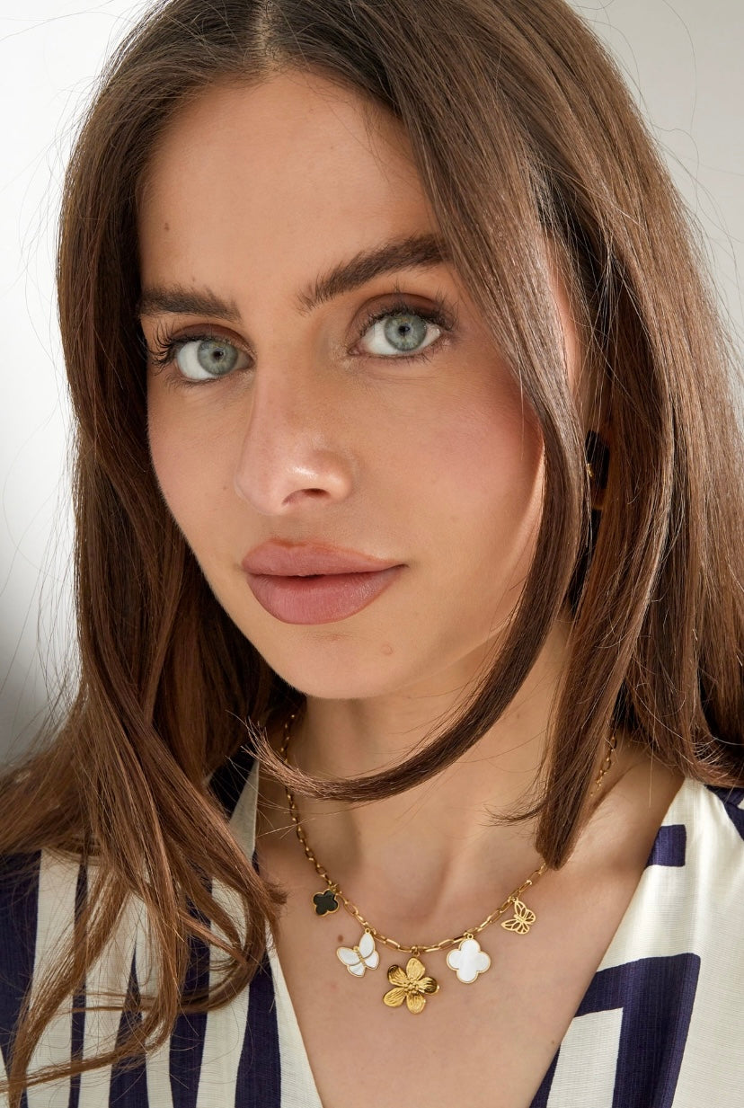 Statement ketting met hangers in goud