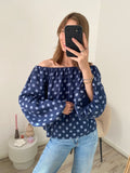 Off shoulder top met lange mouw en polka dot stippen in het navy blauw