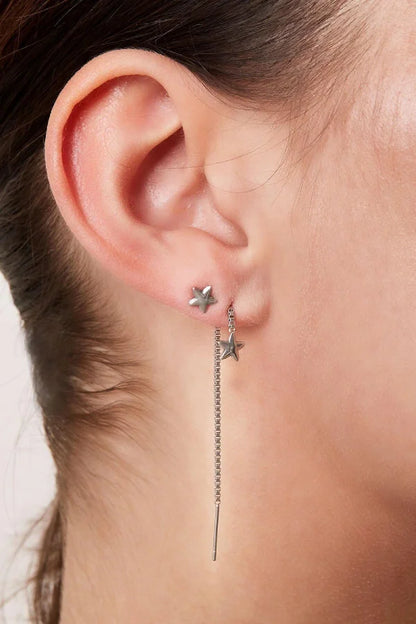 Sterretjes oorstuds in oor zilver
