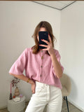 Cardigan vestje met korte mouw en knopen in het roze