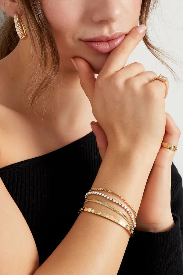 Statement armband met schakel, glitter en platte armband goud