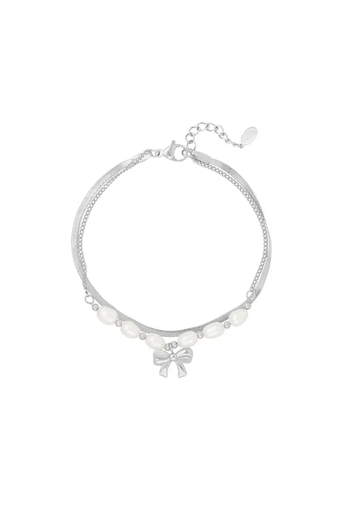 Armband zilverkleurig strik en parels