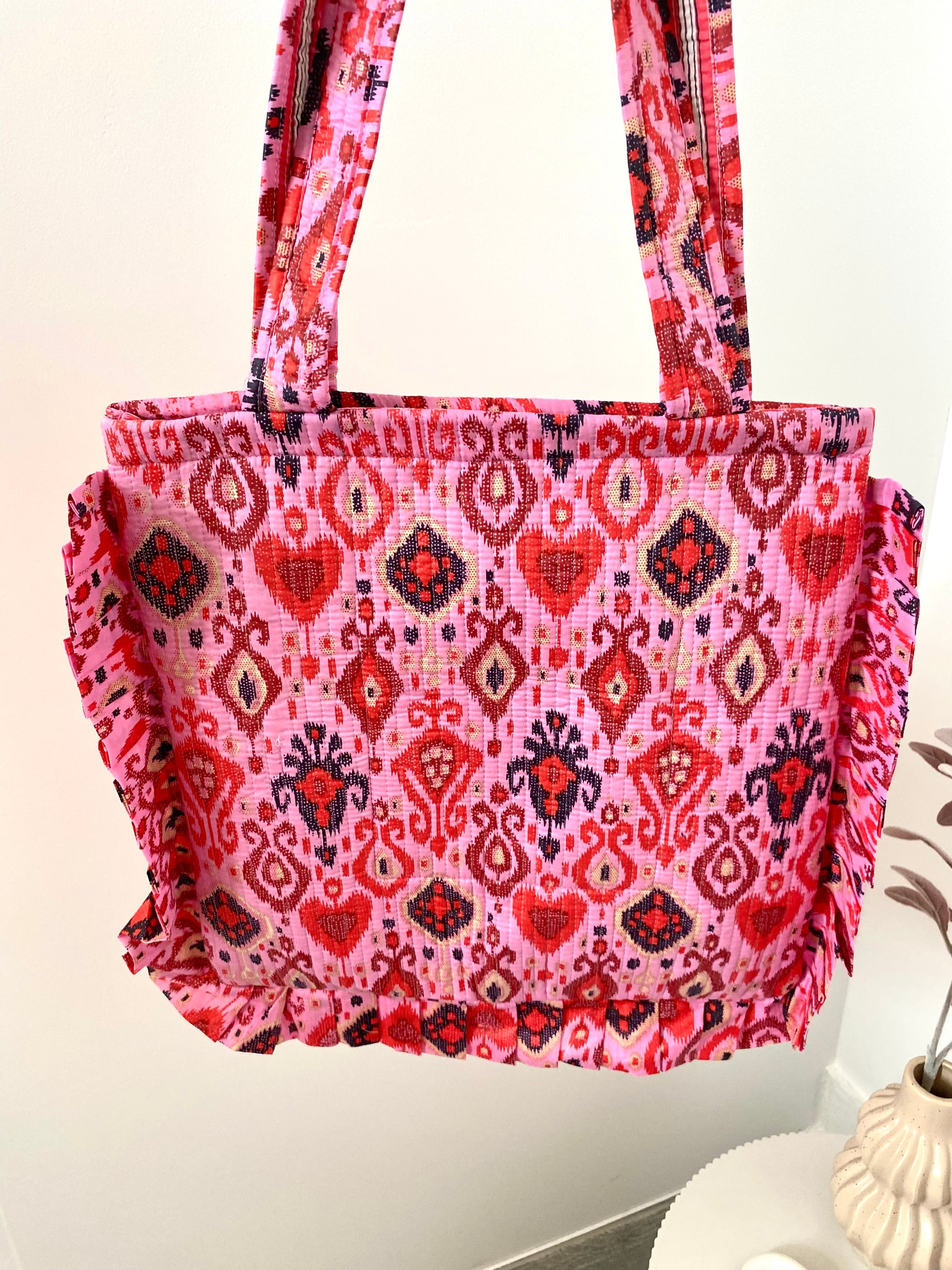 Tas met roze rode print met hengsel en ritssluiting