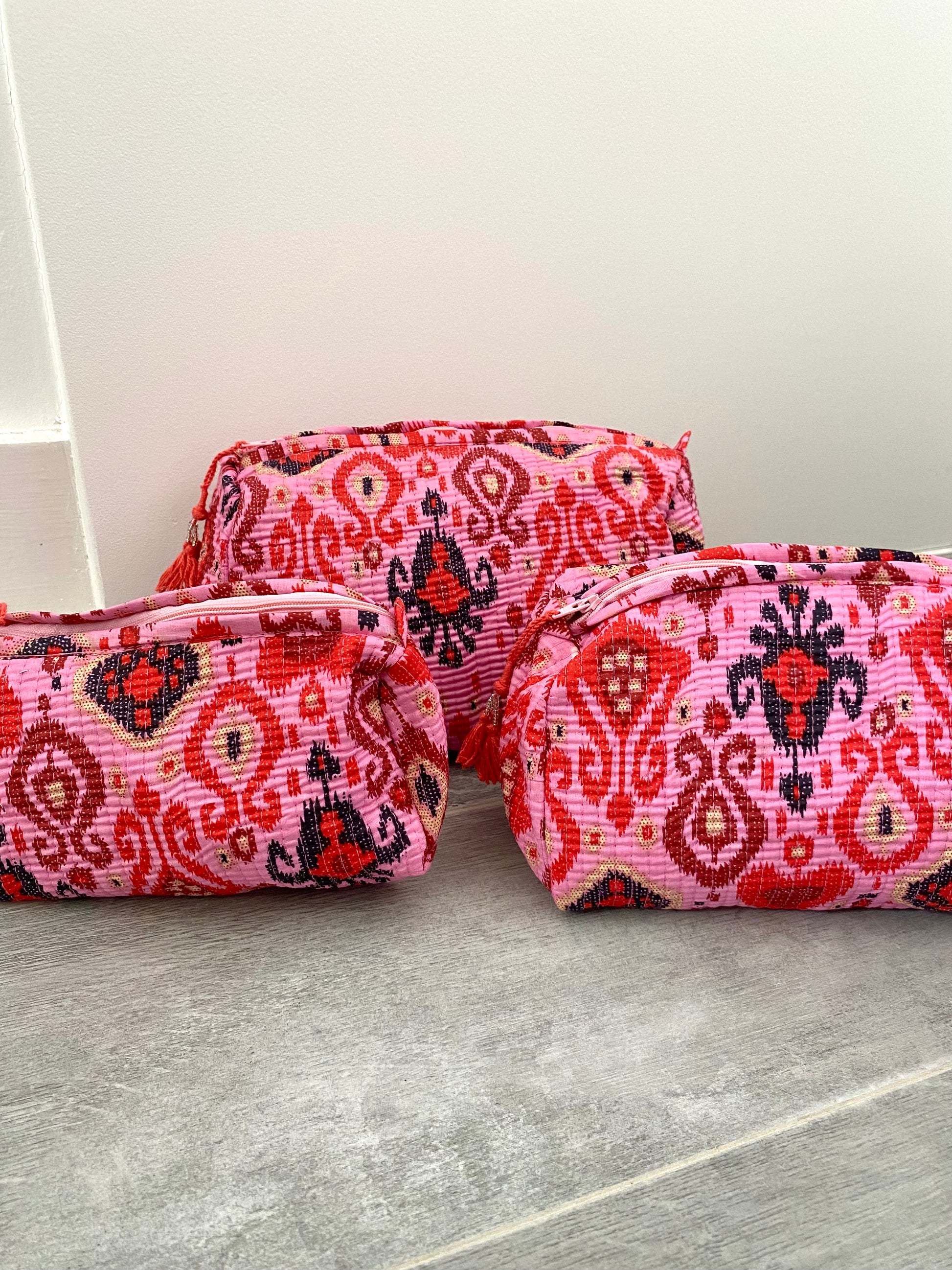 Toilettassen met roze print