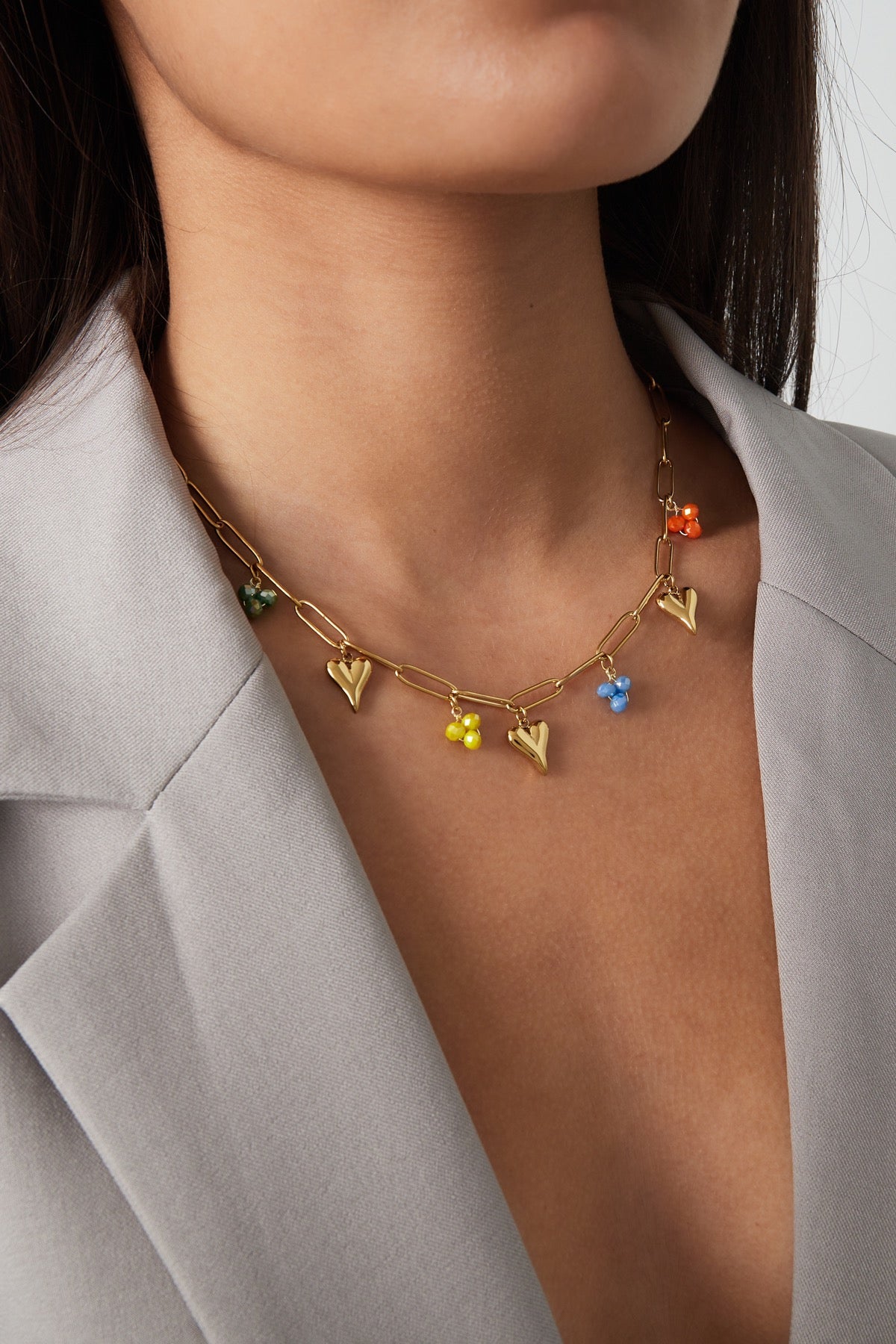 Ketting met hartjes en kralen goud