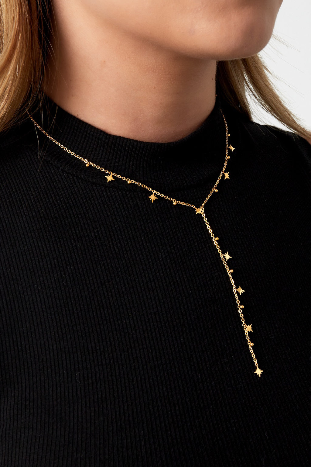 Lange ketting met sterretjes goud