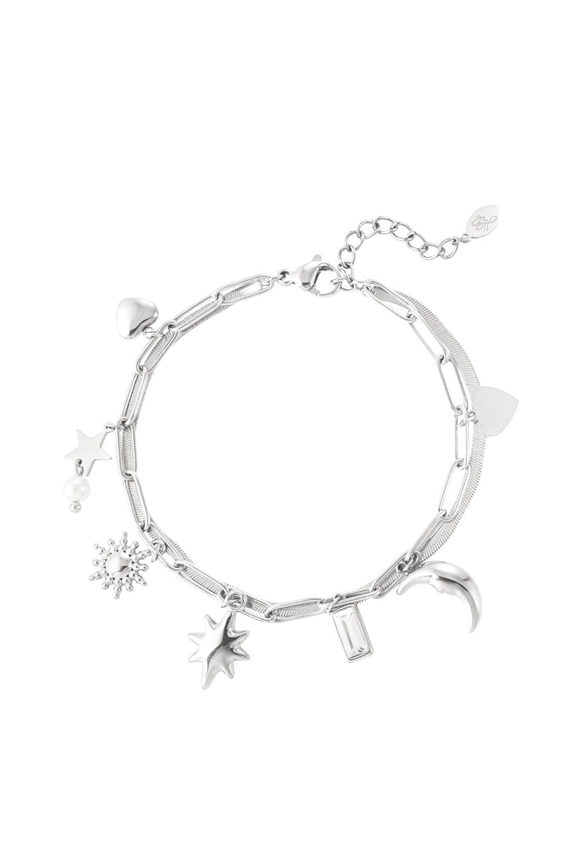 Schakelarmband met hangers van maan, ster en hartjes zilverkleurig