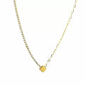 Ketting goud met glitter en schakel en hanger van klaver